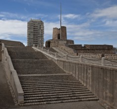 Staircase and ramp to the town, battery tower and modern tower block above