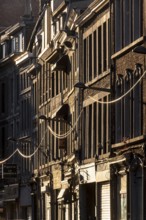 Liège, houses in the old town centre against the light