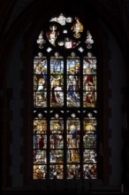 Renaissance window from 1535 on the end wall of the south aisle: Lamentation, below which the donor