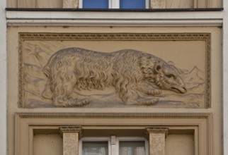 Stucco relief of a bear, relief possibly early modern, façade ca. mid-19th cent