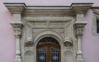 Freyburg Unstrut. House at Markt 14, Renaissance seating niche portal inscription dated 1554, upper