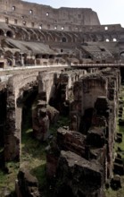 Interior with wall remains below the former arena