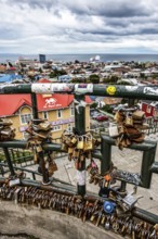 Love locks on a fence, viewpoint over Punta Arenas, Patagonia, Chile, South America