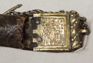 Belt of St Liudger, silver buckle with relief of St Liudger in episcopal regalia with a model of a