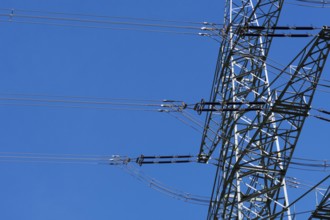 High-voltage line, electricity pylon in front of blue sky, energy supply, power line, electricity,