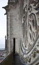 Start of construction 1220, rose window of the west façade, partial view of the connecting corridor