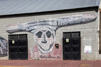 Mural with aboriginal grove cult, harbour of Ushuaia, Argentina, South America