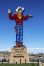 Neon cowboy Wendover Will, landmark of West Wendover, Nevada, USA, North America