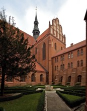 Former Cistercian church, cloister courtyard with a view of the south transept from the south-west,