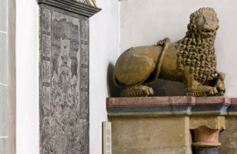 Romanesque lion, Saint, Saint