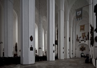 North aisle facing south-west with church flags and view into the nave, St., Sankt, Saint