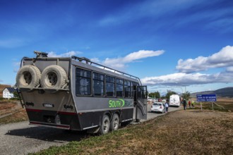 4x4 bus for mountaineering group on the Rio Gallegos-Chile border, Santa Cruz, Patagonia,