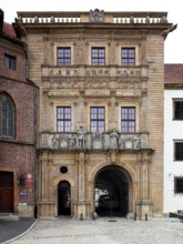 Begun in 1544, above the passageway figures of Duke George II and Barbara of Brandenburg, above