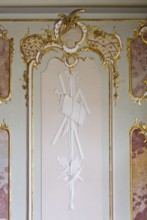 Rococo hall, stucco detail, allegory of the arts