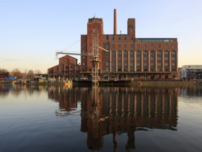 View of the south side, Werhahn mill with grain crane