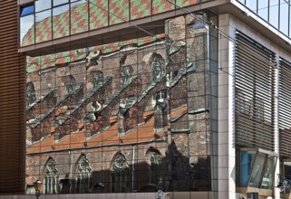 Reflection of the south side of the nave in a modern neighbouring building, St., Sankt, Saint