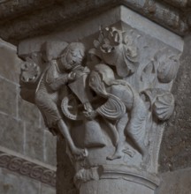 Vezelay, Basilica of Ste-Marie-Madeleine. Interior. South aisle figure capitals. St Paul and Moses