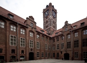 Town hall, courtyard view from north-west with tower