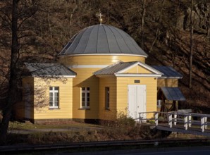 Formerly a tea pavilion, built in 1812-15 to a design by Schinkel, domed rotunda with cross arms,