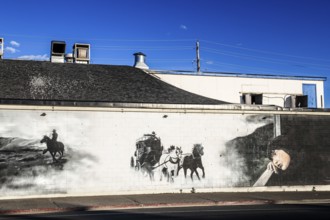 Mural with stagecoach, Elko, Nevada, USA, North America