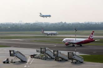 Taxiway, aircraft taking off and landing