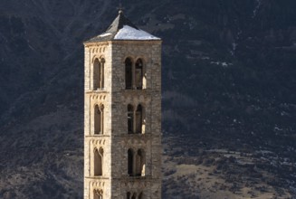 Taüll, Sant Climent, bell tower against the mountain backdrop