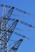 High-voltage line, electricity pylon in front of blue sky, energy supply, power line, electricity,