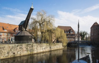 Lüneburg Old Crane 93429 built in 1797 with inner treadwheel on the banks of the Ilmenau in