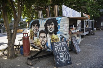 Food stall advertising Lionel Messi and Diego Maradonna, Ushuaia, Argentina, South America