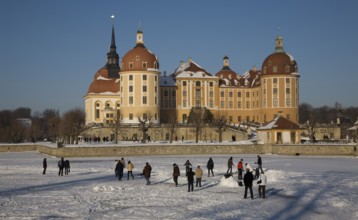 Winter, tobogganing on the frozen lake, sledging, tobogganing, winter sports