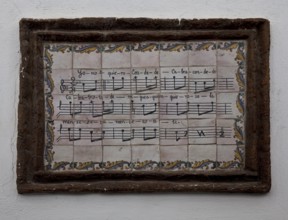 Cordoba, tile painting in the Jewish quarter. Song verse in text and notes painted on tiles in the