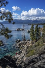 Hiker at Sapphire Cove, Lake Tahoe, Nevada, USA, North America