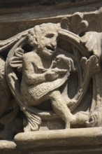 Romanesque capital on the west side of Paradise, Devil noting sins, St., Saint, Saint