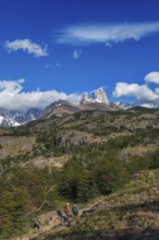 Trekkers at Cascada Martin with a view of the Fitzroy Massif, El Chaltén, Los Glaciares National