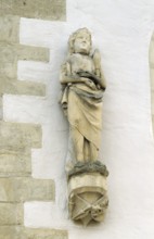 Christ figure on the north wall, exterior