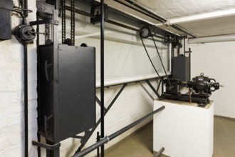 Cellar under the ladies' room, restored mechanism for lowering the large window to the garden,