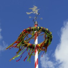 A colourfully decorated maypole, craft, tradition, colourful, colourful, blue sky, customs