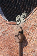 Built 1734-1742 for Dutch craftsmen, gable detail with scroll and downpipe