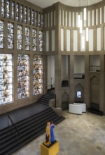 Central entrance hall with staircase and Jan Thorn-Prikkers leaded glass window mural