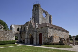 Ruins of the monastery church, sacristy and remains of the cloister, behind it south transept gable