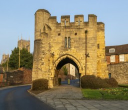 Pottergate medieval stone archway entrance to cathedral area in city of Lincoln, Lincolnshire,