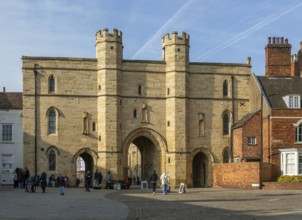 Sun shining on Exchequer Gate, Minster Yard, city of Lincoln, Lincolnshire, England, UK