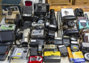 Display of old secondhand cameras and photographic equipment on display at auction, Campsea Ashe,