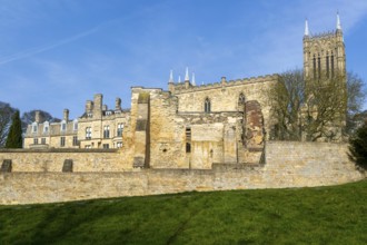 Walls of medieval Bishops' Palace from Temple Gardens park, city of Lincoln, Lincolnshire, England,