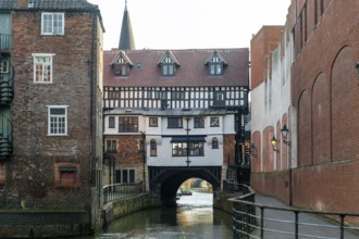 Timber framed buildings on historic High Bridge over River Witham, Lincoln, Lincolnshire, England,