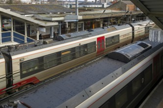 Looking down from above at Greater Anglia trains at platforms of Ipswich railway station, Suffolk,