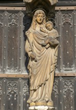 Statue of Mary and baby Jesus in doorway, Cathedral Church of the Blessed Virgin Mary, Lincoln,