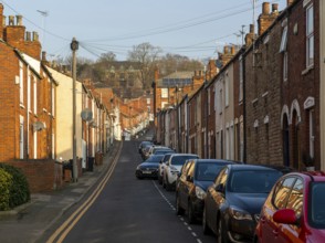 Victorian terraced housing with no front gardens, St Hugh Street, inner city of Lincoln,