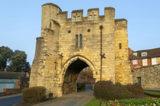 Pottergate medieval stone archway entrance to cathedral area in city of Lincoln, Lincolnshire,