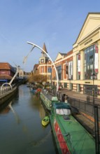 Narrow boats River Witham waterside shopping centre, Lincoln, Lincolnshire, England, UK -